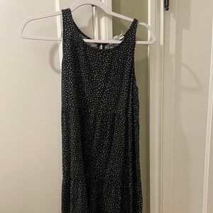 Black and white polka dot flowy tank dress